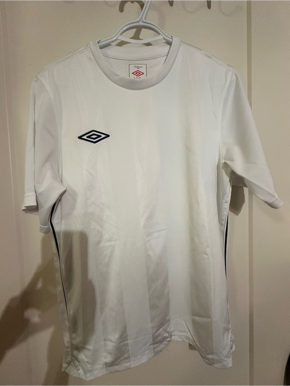 Umbro White Men’s Short Sleeve Athletic Jersey with Black Logo